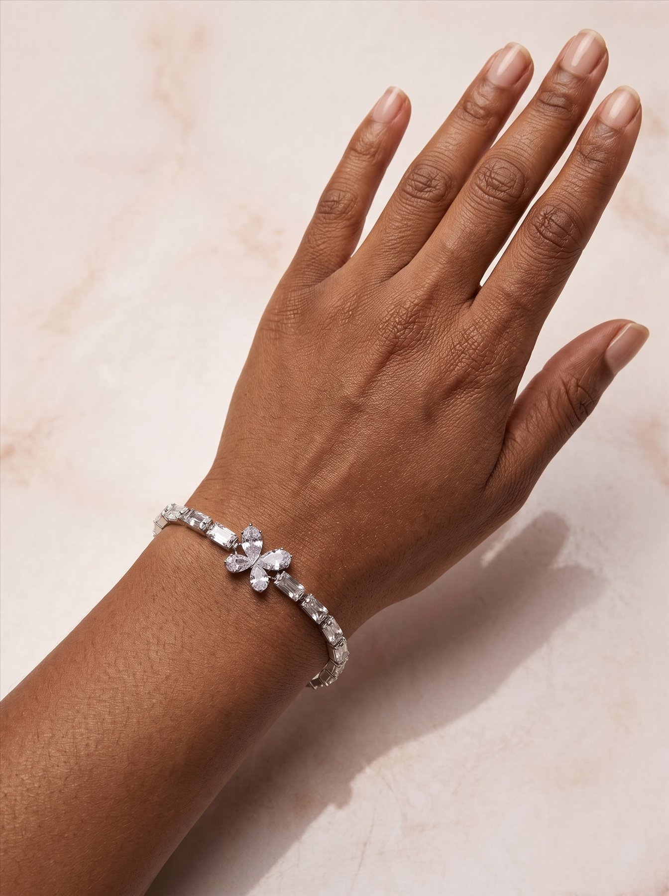Crystal butterfly bracelet worn on the wrist